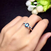 Angel wing blue topaz gemstone ring