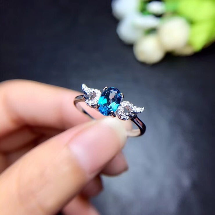 Angel wing blue topaz gemstone ring