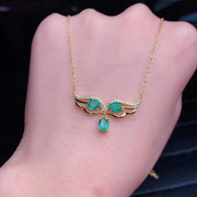 classic angel wing emerald gemstone pendant